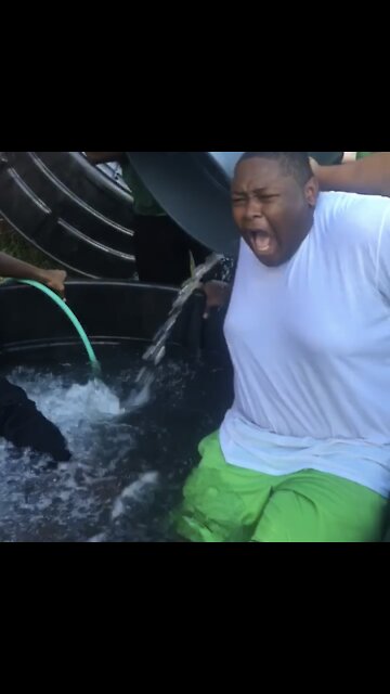 Football player reluctantly takes painful ice bath