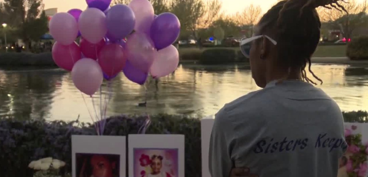 Candlelight vigil for mother, daughter