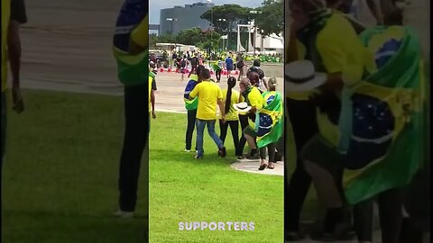 A Police Car Drives Through A Crowd Of Bolsonaro Supporters In Brazil