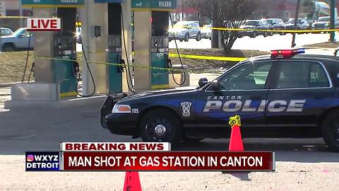 Man shot at Canton gas station; suspected shooter in custody