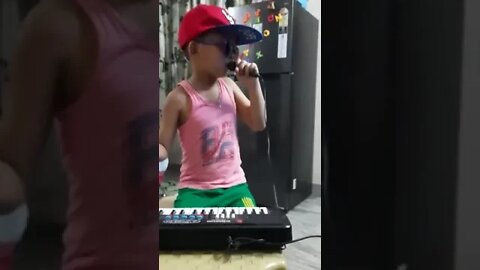 kid singing karaoke