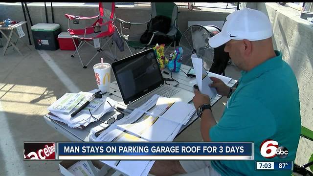 Man stays on parking garage for three days