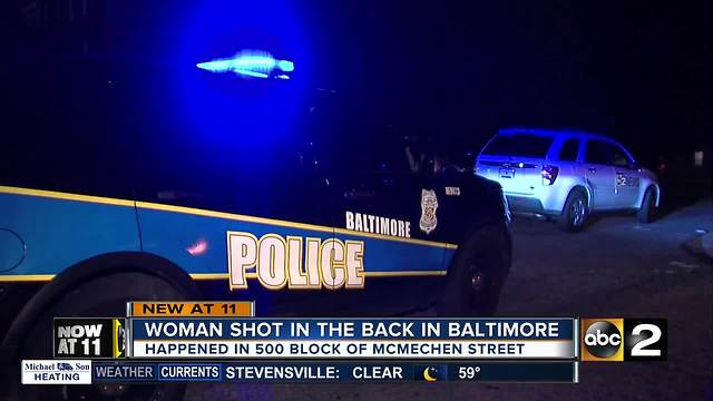 Woman shot in back near Shake and Bake