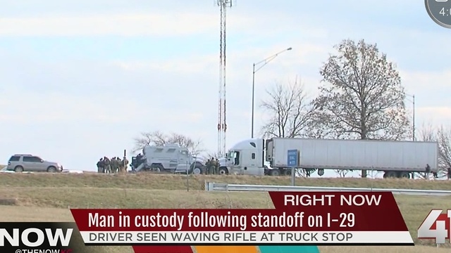 One in custody after gun threat at rest stop