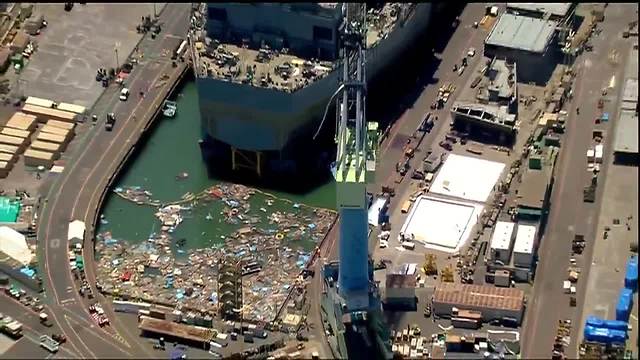 Barrier collapses, flooding San Diego dry dock