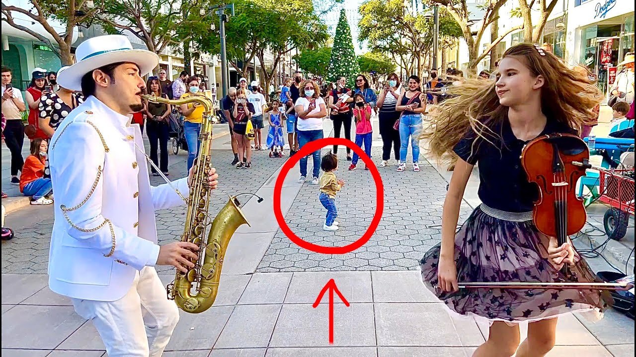 1-year-old baby JOINS "Dance Monkey" | STREET PERFORMANCE - Karolina Protsenko & Daniele Vitale SAX