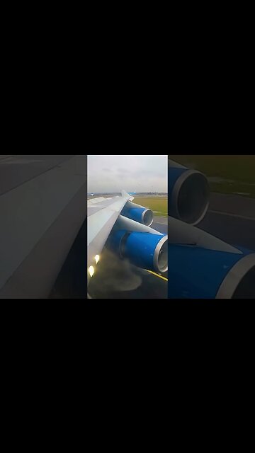 💙747 on wet runway💙