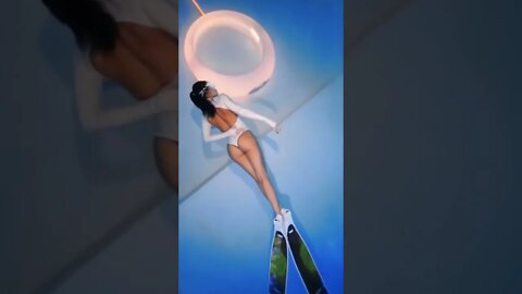 Long Lean Chinese Girl Floats Slowly To The Top