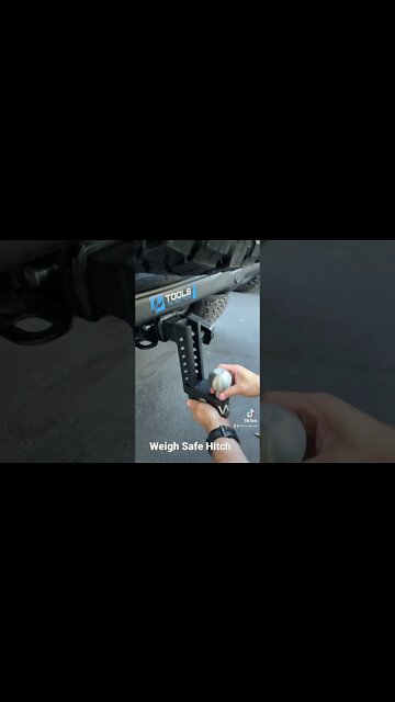 Weighsafe clamshell hitch