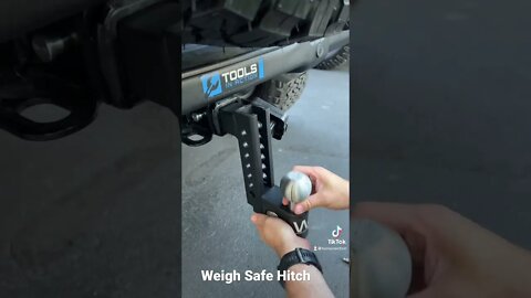 Weighsafe clamshell hitch