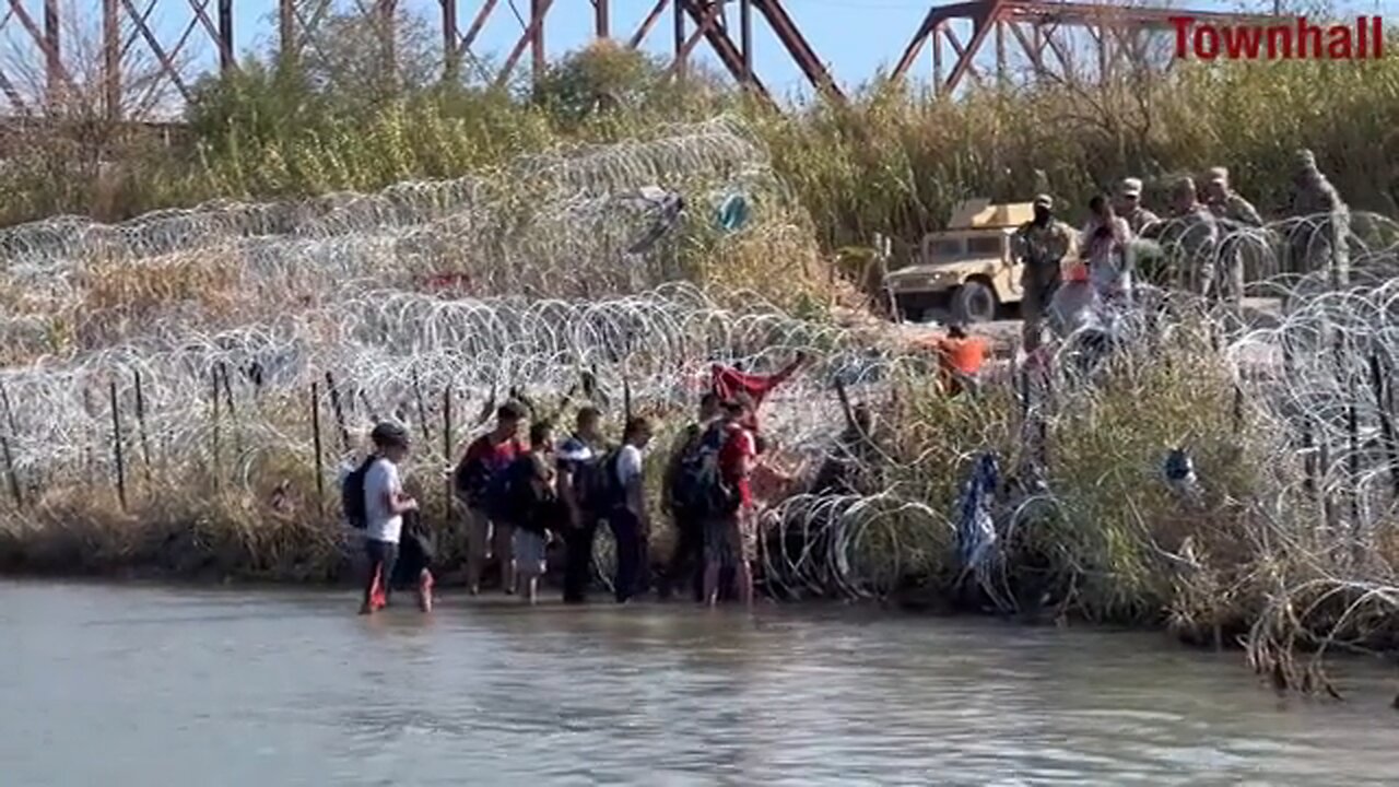 Texas National Guard are allowing illegal invaders through the razor wire