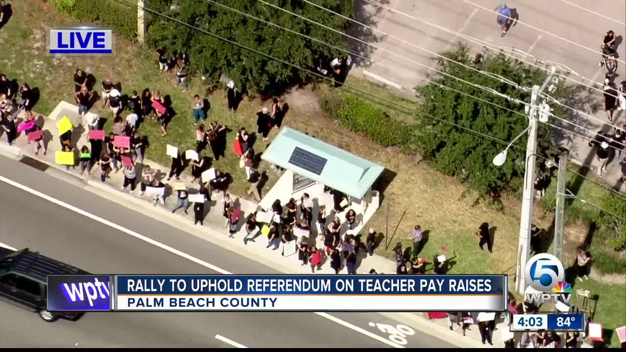 Palm Beach County teachers rally to protect pay raises approved by voters