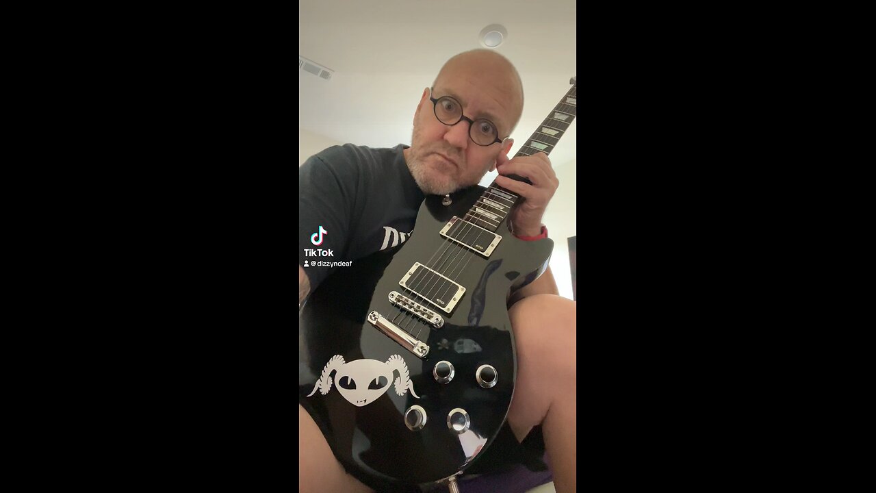 Bald Guy Guitarist