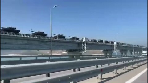 Towards new Russian regions: Russian train transporting armored forces along the Crimean bridge.