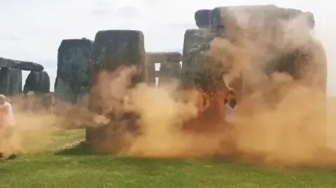Just Stop Oil climate LARPers spray Stonehenge with orange paint