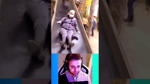 WOMAN CRACKS TAIL BONE ON SLIDE💀#shorts #reaction #youtubeshorts #viral #short #trending