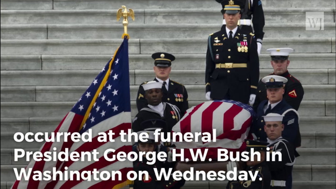 George W Bush Offers Lighthearted Gesture to Michelle Obama at His Father’s Funeral