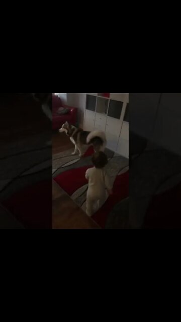 Cute adorable baby child with warm white and pink hat with cute baby girl