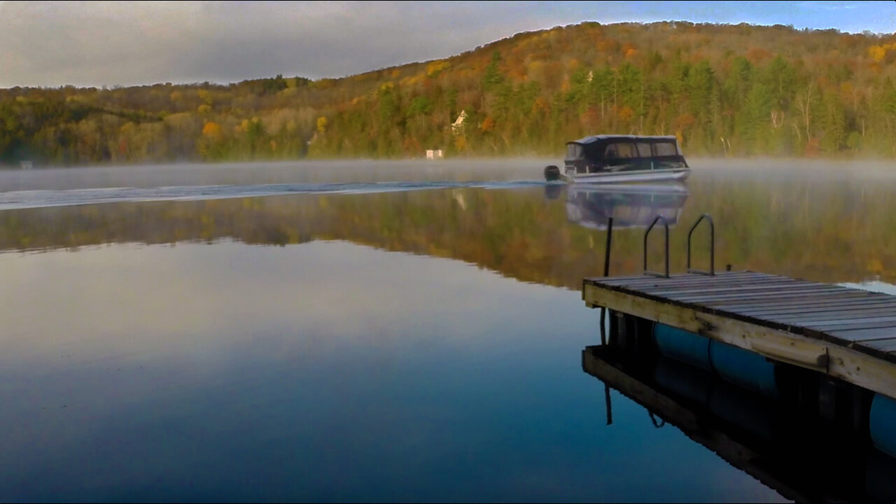 Foggy October lake burn-off. Timelapse