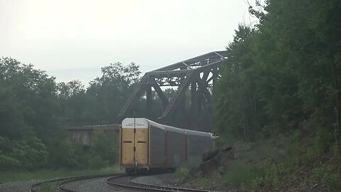 Empty Autorack pass west near the Keyston viaduct.