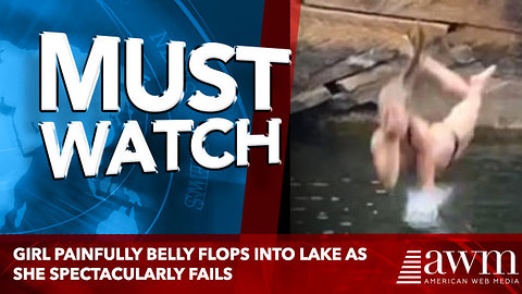 Girl painfully belly flops into lake as she spectacularly fails