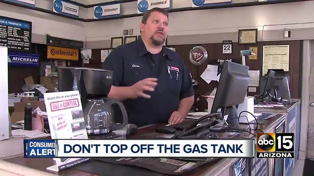 Experts warn topping off gas tank costs more