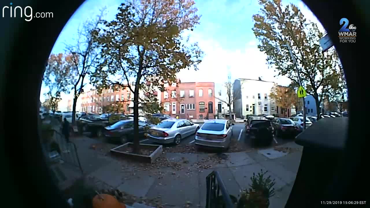 Video captures woman being attacked, robbed outside Patterson Park home