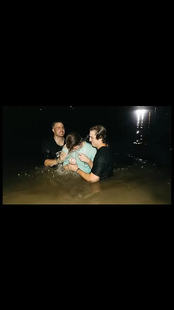 Revival at Auburn with mass baptism in lake