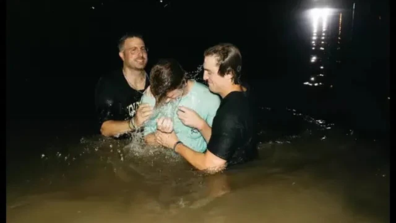 Revival at Auburn with mass baptism in lake