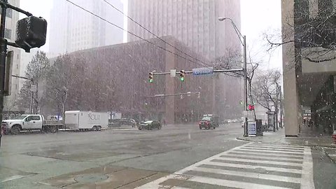 Snow coming down on E.9th Street and Chester