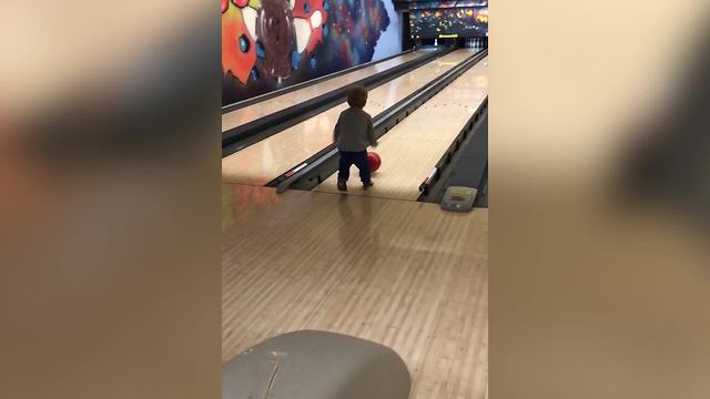 A Tot Boy Slips And Falls As He Is Bowling, But He Still Gets A Spare