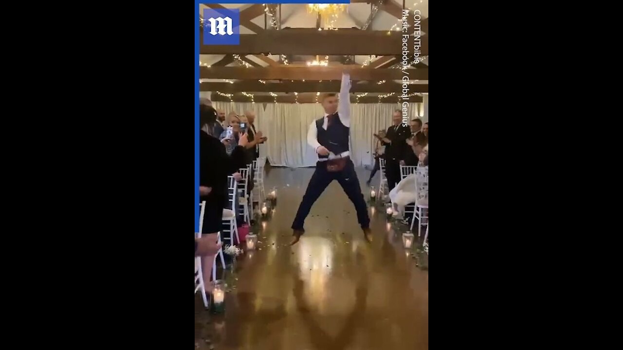 Hilarious flower 'boy' dances his way down aisle