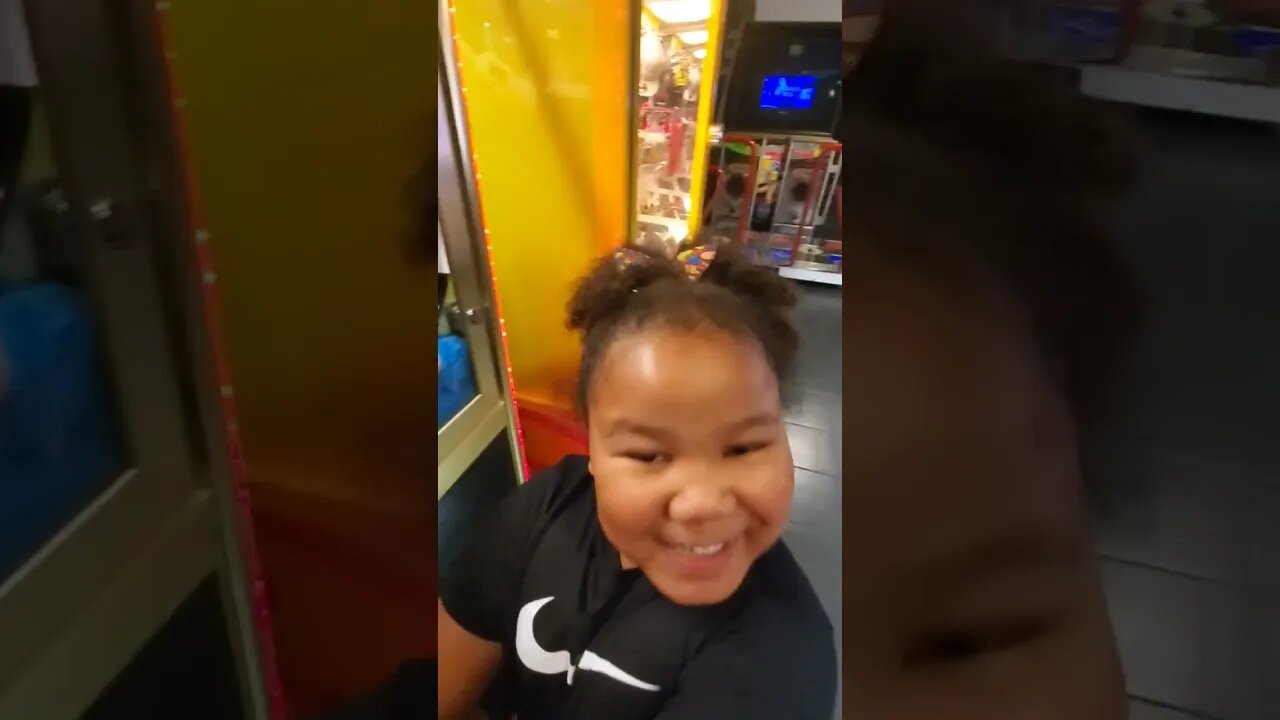 At the Arcade playing videogames