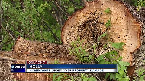 Holly homeowner wants construction mess cleaned up, officials can't say who is responsible