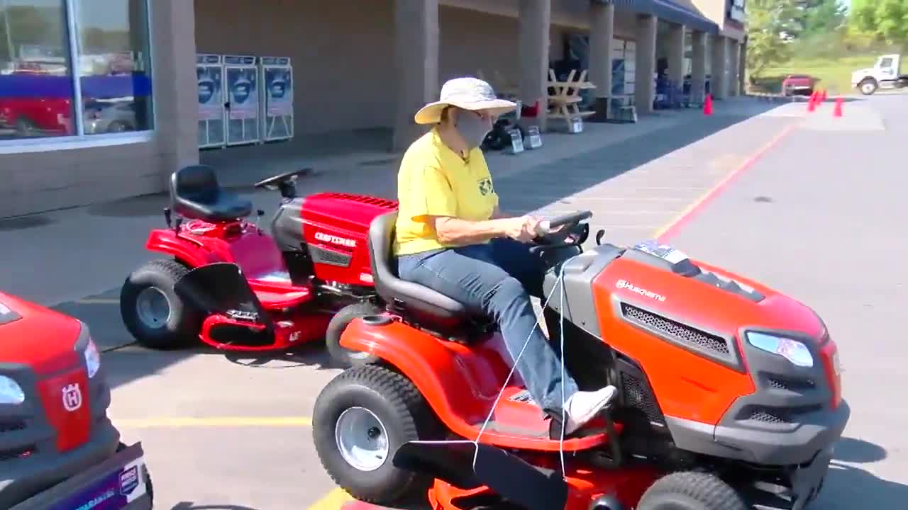 Local woman receives mower for her dedication, hard work