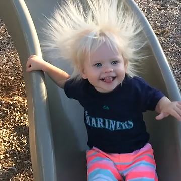 Slide makes Little Boy’s Hair Stand On End
