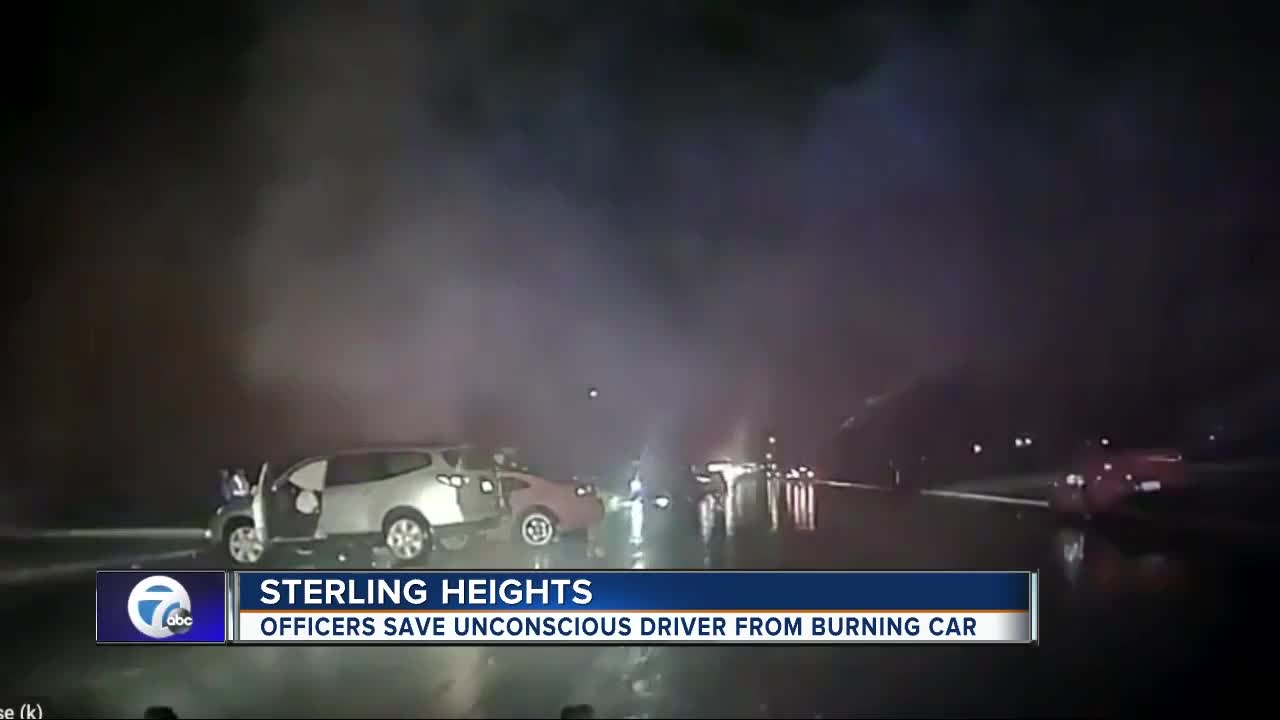 VIDEO: Sterling Heights police officers save man from burning car