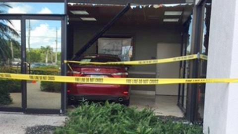 Car slams into BankUnited building in Delray Beach