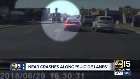 Dash camera captures near crash in 'suicide lane' in Phoenix