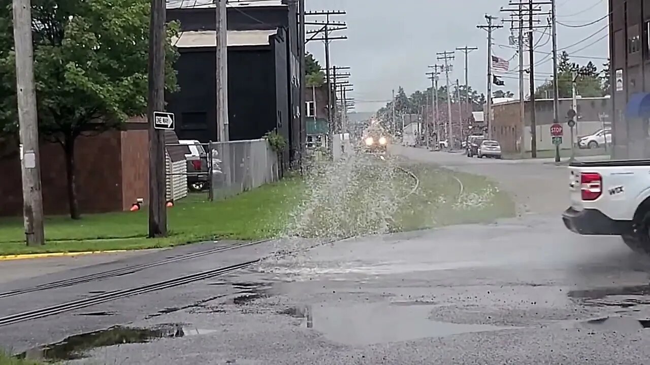 Slow Moving, Street Running Freight Train & Crazy Drivers! #trains #trainvideo | Jason Asselin