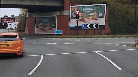 Car driver goes through red light