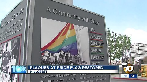 Plaques at Hillcrest Pride flag restored