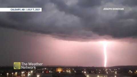 Dark clouds sink in the sky bring continuous flashes of lighting