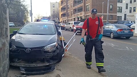 Boston police and fire respond to a single-car accident on Geneva Ave