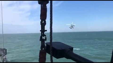 Ka-29TB naval assault transport helicopter lands on a ship