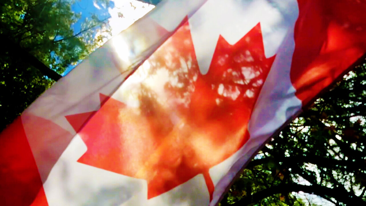 Canadian flag sun flares, slow-motion close-up