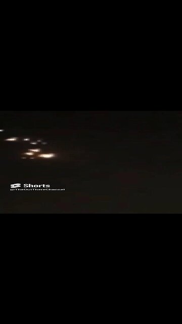 PyroSkydivers with LED suits over great pyramids some glide and rise on desert thermals -Giza Egypt