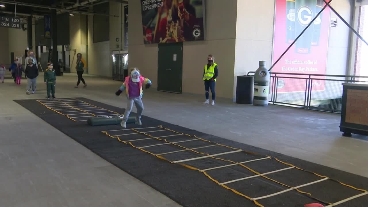 Children were out moving for Project Play 60 Express at Lambeau Field on Saturday