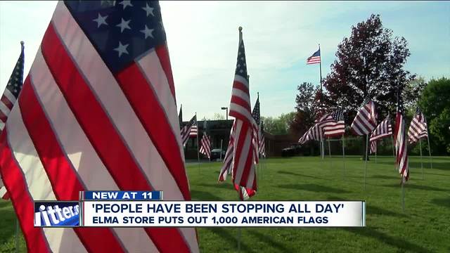 Elma store puts out 1,000 American flags