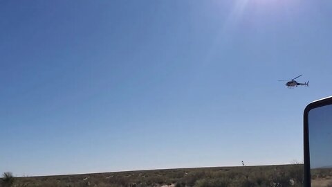 BORDER PATROL HELICOPTER AT WORK